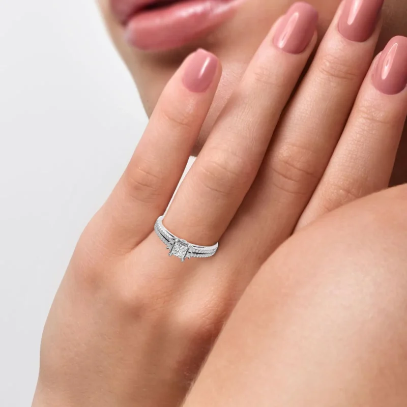 diamond rose embrace ring worn on woman finger